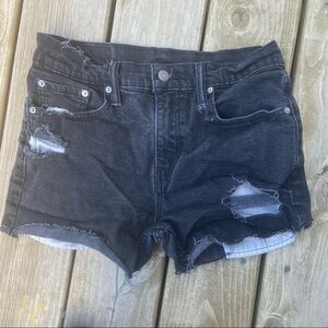 Vintage black Levi’s 502s distressed shorts w30